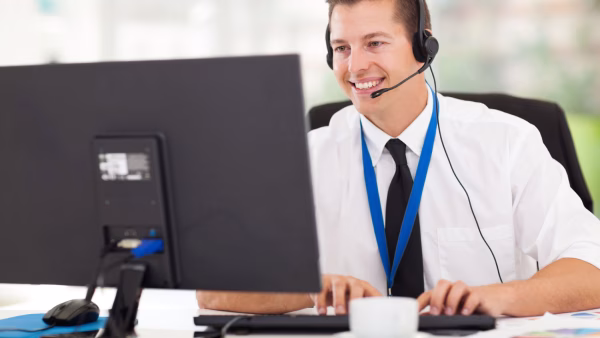 technical support operator working on computer